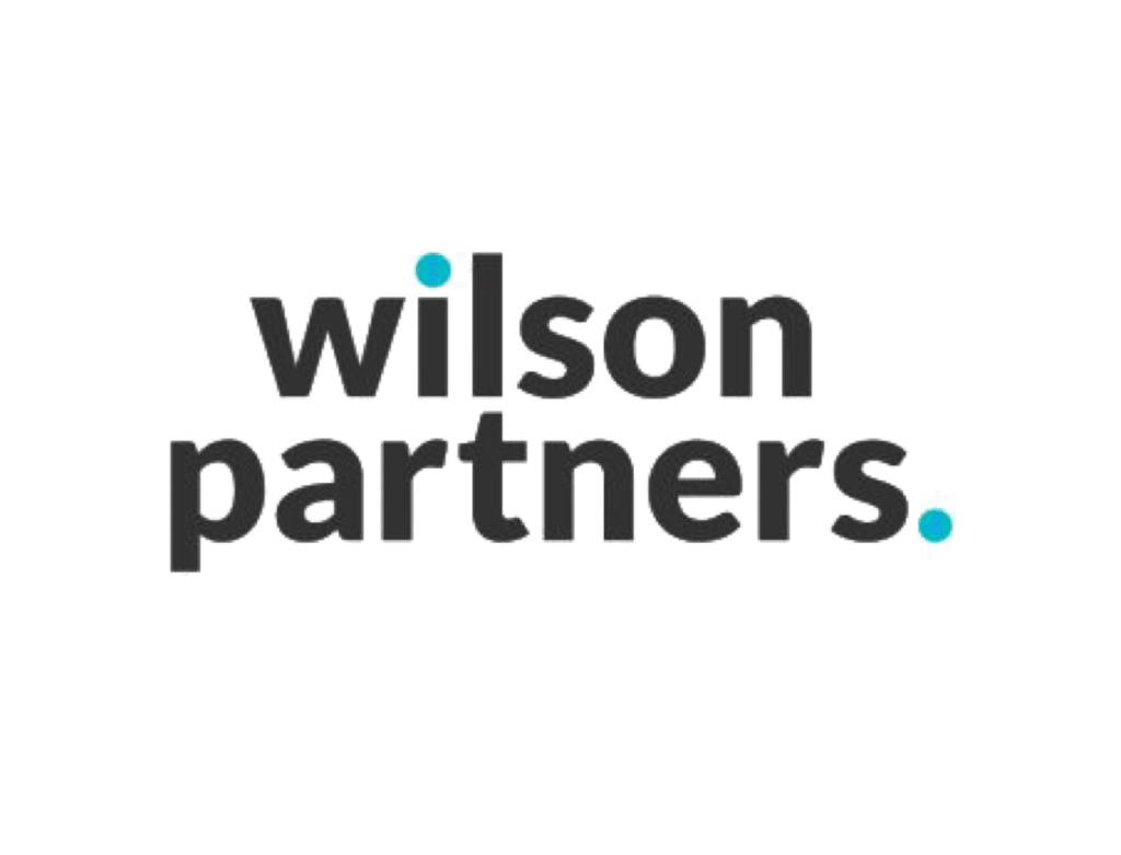Wilson Partners' logo has wilson above the word partners in black text. The dot on the i and the full stop after partners are both light blue.